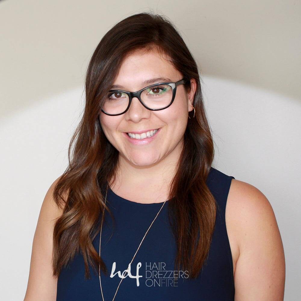 Anna, front desk coordinator at Hair Drezzers On Fire hair salon in San