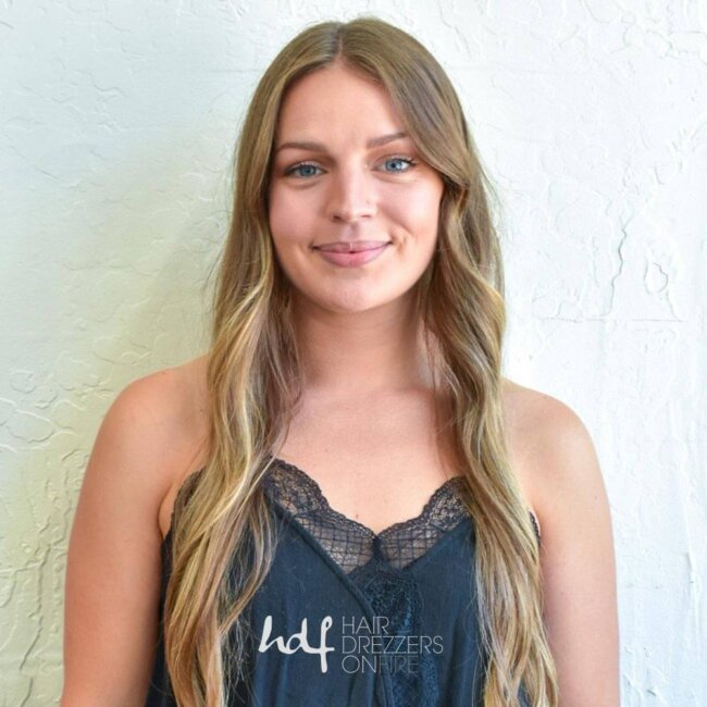 Bella, hair stylist at Hair Drezzers On Fire hair salon in San Diego