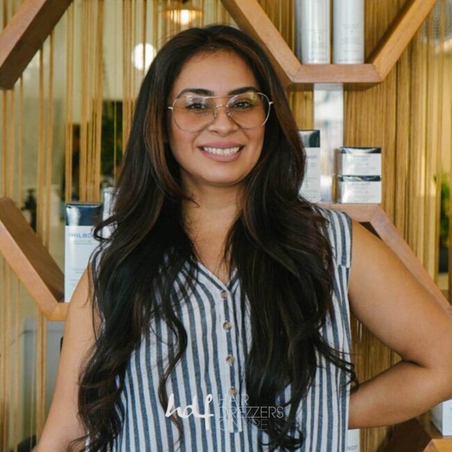 Daniela (Dee) Flores Perez, hair stylist at Hair Drezzers On Fire hair salon in San Diego
